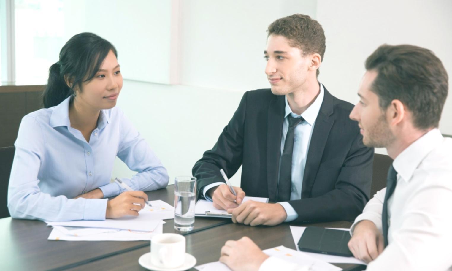 Team psychology workshop participants in a collaborative setting